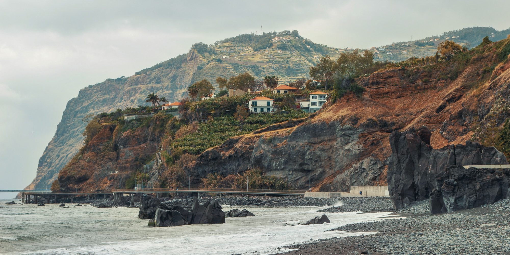 Volcanic beach with dramatic landscape in Funchal, Madeira.jpg